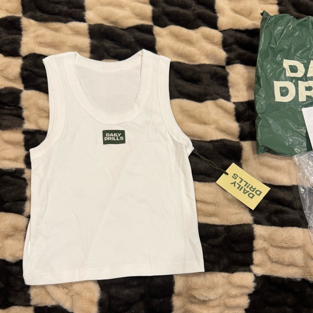 DAILY DRILLS OUT OF STOCK WHITE TANK!!